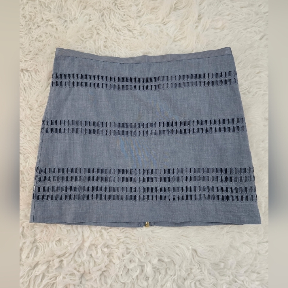 Gap Cotton mini skirt with eyelet cut-out design and Full back zipper. Size 0. G